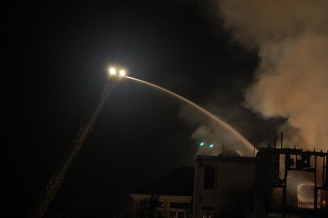 House Fire at the Tattersall development in West Bradford Township.  Assist to Station 39.  Ladder 53 preforming master stream operations.  September 2007.