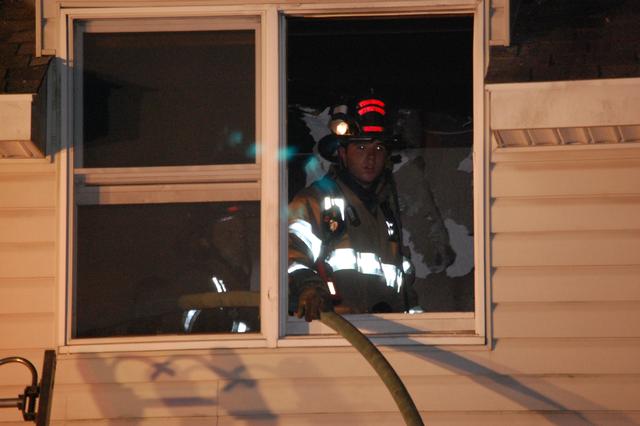 House Fire on Ashbridge Road in West Goshen Township.  FF Justin McClure operating on division 2.  December 2007.