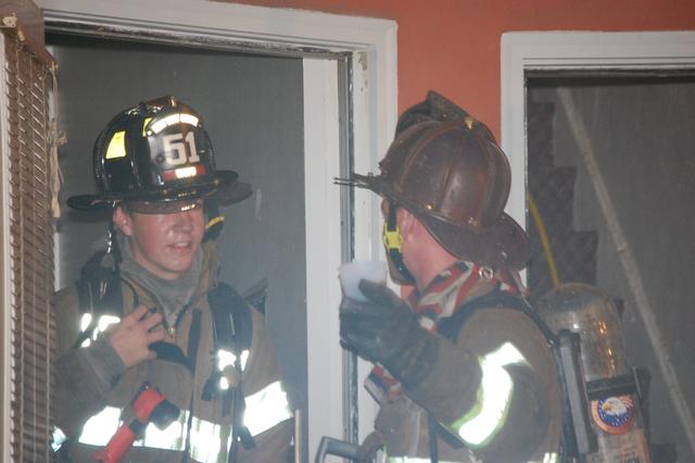 Dwelling Fire on W. Chestnut Street in West Chester Borough.  Pictured FF's John O'Brien and Kevin Beans.  August 2007.