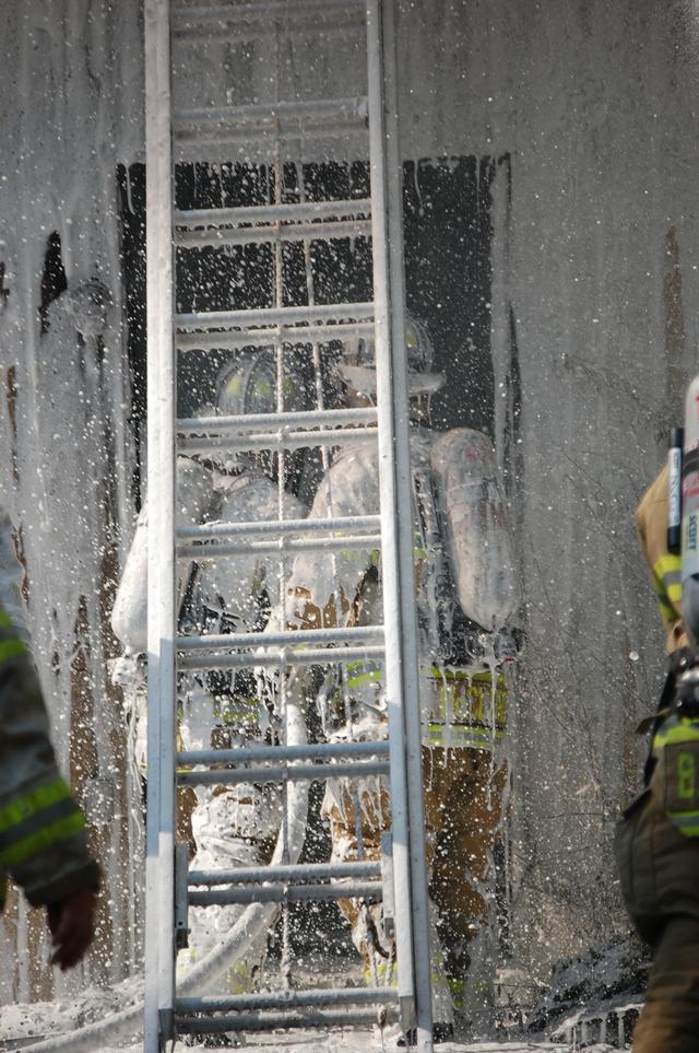 Town Home Fire at Exton Station in West Whiteland Township. Assist to Station 6. Pictured FF's Justin McClure and John O'Brien. July 2008.