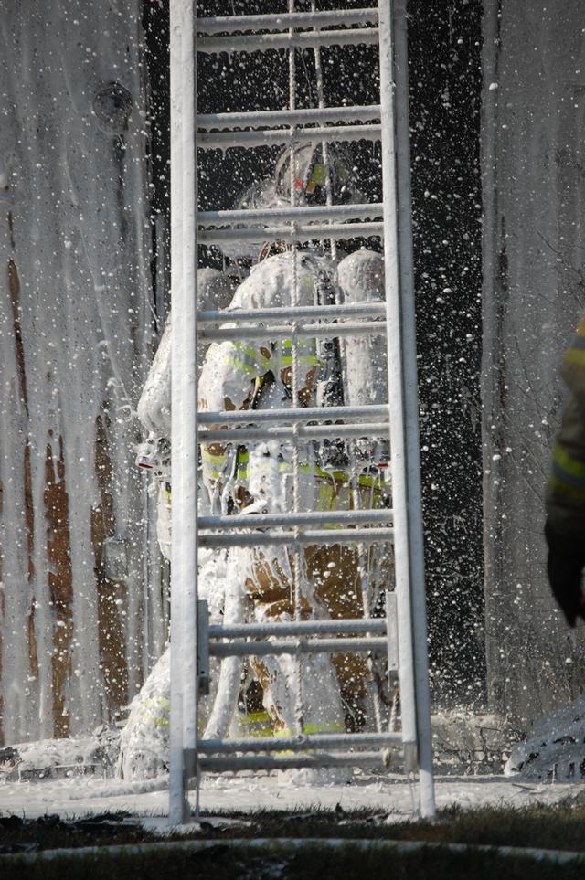 Town Home Fire at Exton Station in West Whiteland Township. Assist to Station 6. Pictured FF's Justin McClure and John O'Brien. July 2008.