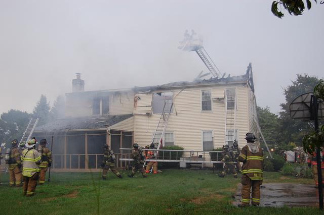 House Fire on Exeter Drive in West Goshen Township.  West Chester crews operating on side C.  July 2010.
