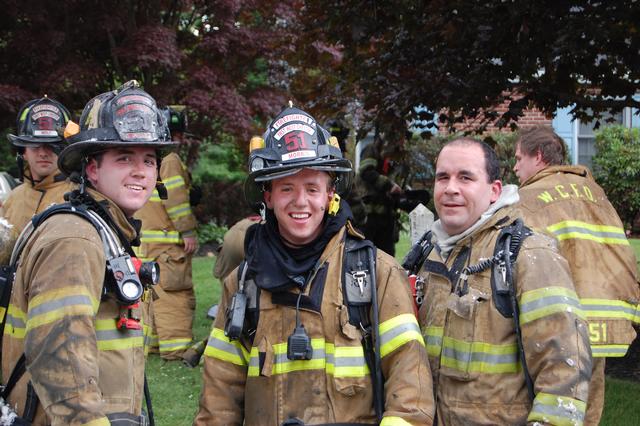 House Fire on Greystone Drive in West Goshen Township. Pictured FF's Justin McClure, John Morris, and Scott Joblin.  July 2010.