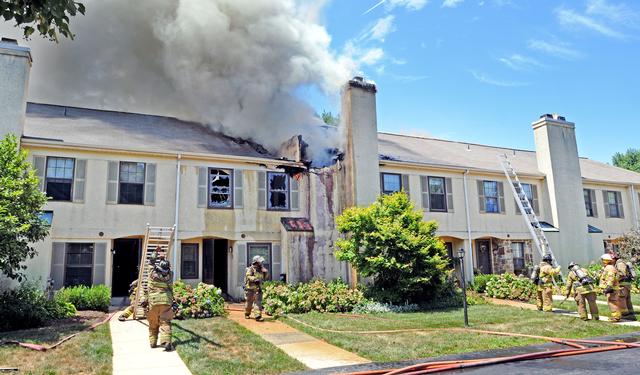 Town Home Fire in Bradford Square, East Bradford Township. Interior crews making an aggressive attack. August 2011.