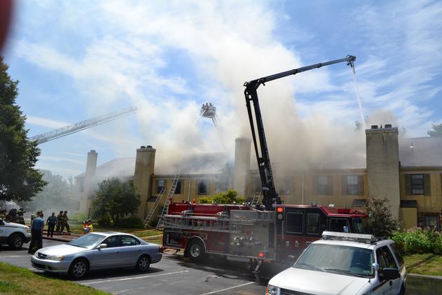 Town Home Fire in Bradford Square, East Bradford Township. Engine 51-1 going into service with the boom after the fire jumped the fire walls. August 2011.
