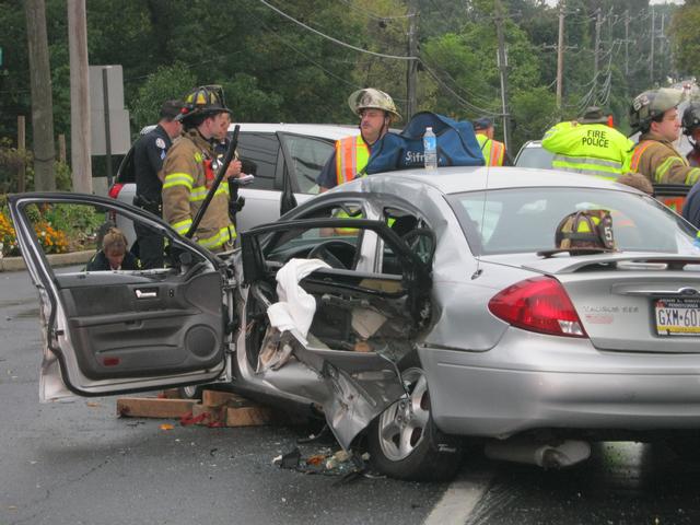 Accident with Entrapment on Pottstown Pike in West Goshen Township.  Pictured Firefight McClure and Asst. Chief McDonald.  October 2011.