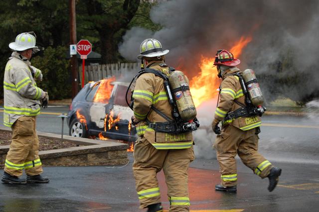 Auto Fire on W. Rosedale Avenue, West Goshen Township. Pictured are Asst. Chief McClure, Captain Pelna, and Lt. Green.  March 2011.