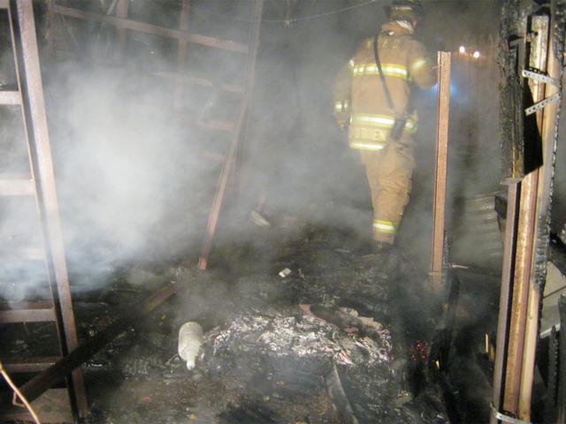 FF John O'Brien at the N. Wayne Street woods fire, April 2012.