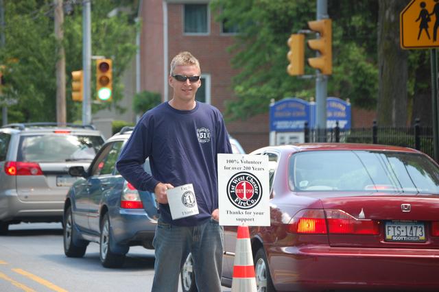 FF Dave Morris collecting money at Tag Day.
