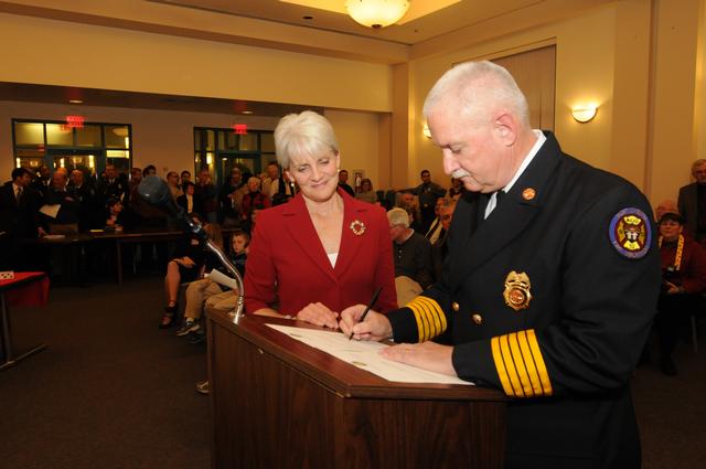 Assistant Chief Dale McClure being sworn in as Chief of the Department, December 2011.