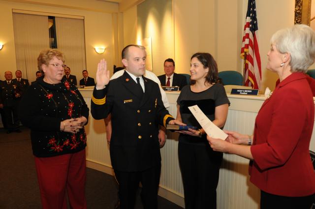 Captain Steve Pelna being sworn in as Assistant Chief, December 2011. 