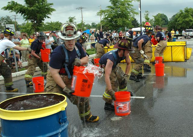 Firefighters from 51 and 53 participating in a firefighter's competition.